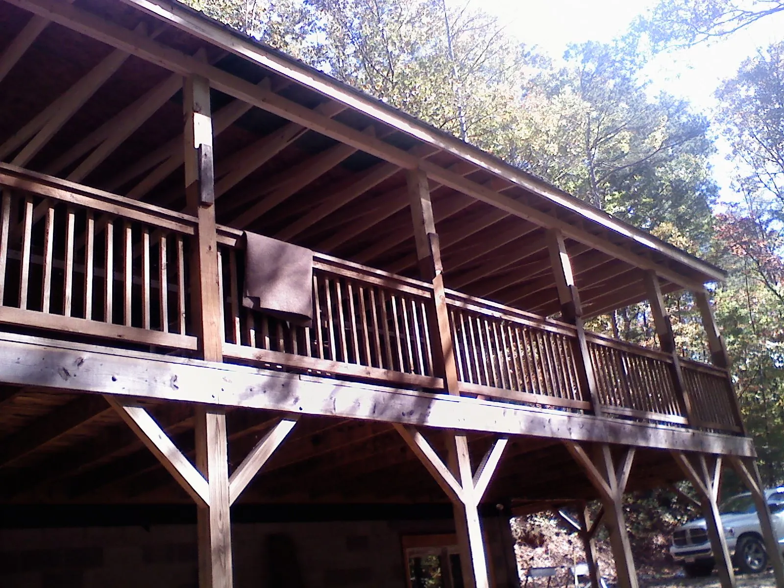 Timber framing under a new elevated porch and deck — Roof Leak Repair in Mallory by Roofing Brothers